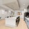 large kitchen with island and seating