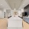 a large kitchen with a large island and seating