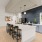a large island in a kitchen with seating