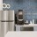 a kitchen with a fridge coffee machine and sink