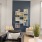 lounge with seating bookshelf and windows