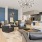 Resident lounge with a kitchen and couches at Wayford at Innovation Park townhomes in Charlotte.