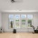 room with exercise equipment and windows