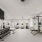 gym with exercise equipment and tv